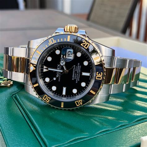 new gold stainless submariner rolex black|Rolex Submariner automatic 18k gold.